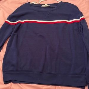 Blue long sleeve sweater.